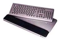 Gel-filled adjustable wrist rest for keyboards.